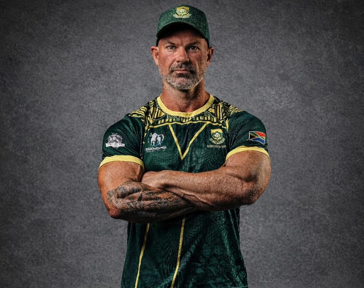 Steven Domeris, arms crossed, in the South Africa team shirt